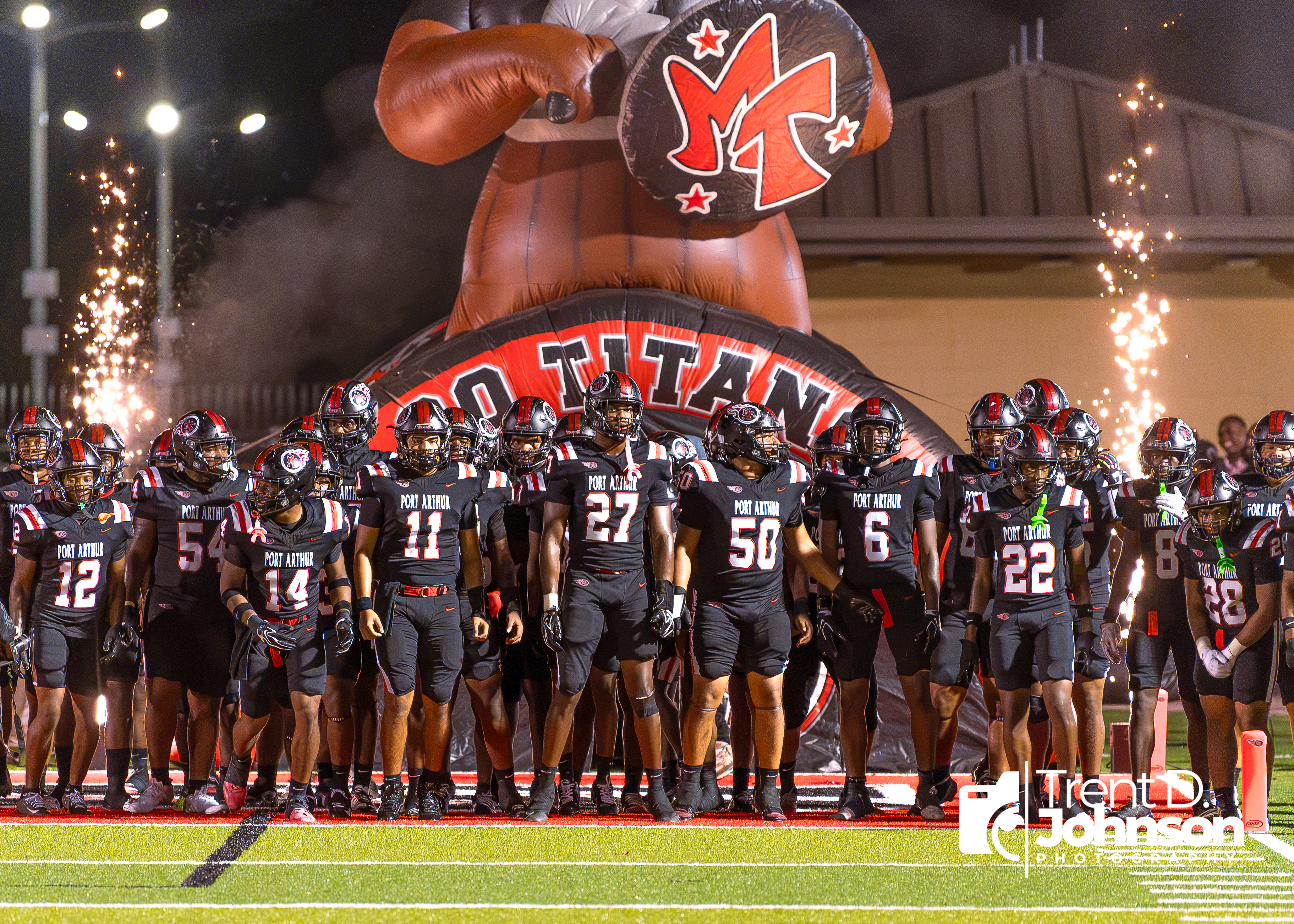 Our Varsity Memorial Titans know how to make an entrance every Friday night!